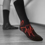 Black work socks with red branding