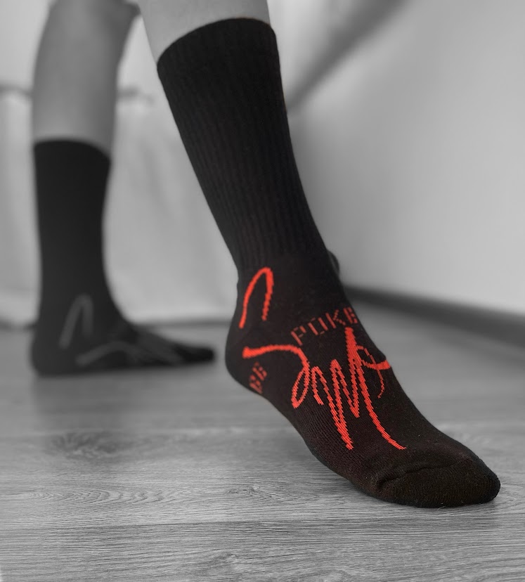 Black work socks with red branding